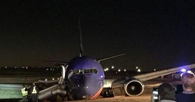 بالفيديو والصور..تهشم طائرة أمريكية بعد هبوط خاطئ وإصابة 8 أشخاص