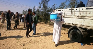 توزيع مساعدات غذائية وإنسانية على 400 أسرة بشمال سيناء