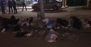 صحافة المواطن..تراكم القمامة وكابلات كهرباء مكشوفة بالشارع الحربى فى دمياط