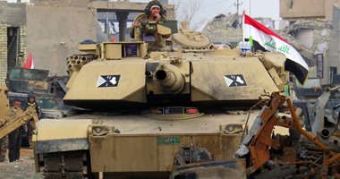 إعلان تحرير الرمادي من قبضة داعش ورفع العلم العراقى على المجمع الحكومى