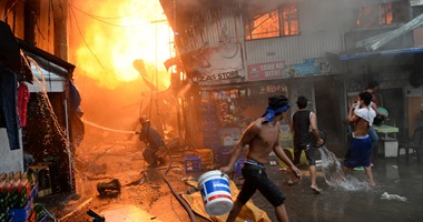 بالصور.. إصابة 3 أشخاص وتشريد الآلاف فى حريق بالعاصمة الفلبينية مانيلا