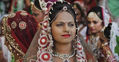 بالصور..حفل زفاف جماعى لـ 151 عروس هندية يتيمة