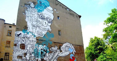 بالصور.. فنانون ببولندا يبدعون فى الرسم على البنايات
