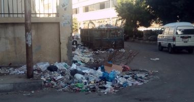 بالصور .. القمامة تحاصر مدرسة عباس العقاد فى الإسكندرية