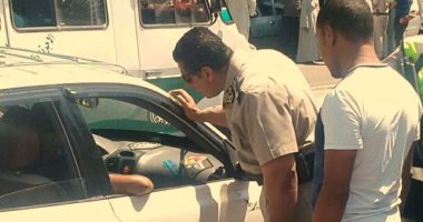 سائق ينتحل صفة ضابط شرطة خلال مروره بكمين فى الهرم