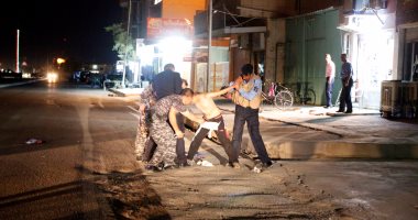 بالفيديو والصور..الشرطة العراقية تقبض على طفل قبل تفجير نفسه بحزام ناسف