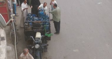 بالصور .. قارئ يرصد معاناة أهالى أوسيم فى شراء اسطوانات الغاز
