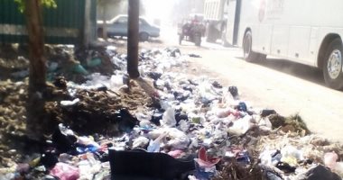أهالى الخانكة يستغيثون من انتشار أكوام القمامة فى شوارع المدينة