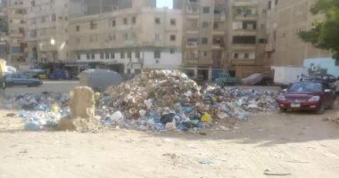 بالصور.. انتشار القمامة فى الجزيرة الخضراء بالإسكندرية والأهالى يستغيثون