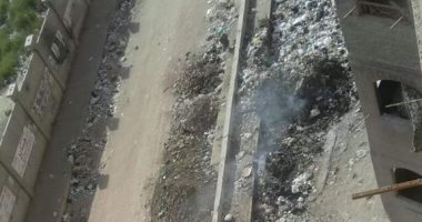 قارئ يشكو من تراكم القمامة وحرقها بمنطقة مطار إمبابة
