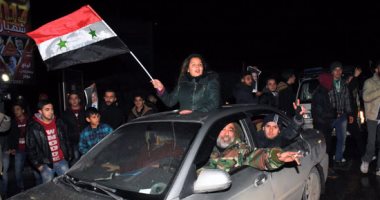 احتفالات فى حلب ومواكب بعد إعلان سيطرة الجيش على المدينة
