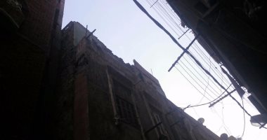  بالصور .. انهيار جزئى فى عقار بالجمرك بالاسكندرية بسبب الطقس السيئ