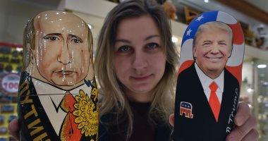 بالصور.. "ماتريوشكا" دمى خشبية روسية مزخرفة بصور "بوتين" و"ترامب"