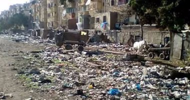شكوى من تراكم القمامة فى شوارع غيط العنب بالإسكندرية