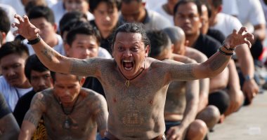 بالصور.. آلاف التايوانيين يحتفلون بمهرجان الوشم المقدس لشحن أجسادهم بالطاقة