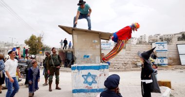 بالصور.. آلاف الإسرائيليين يحتفلون بـ"عيد المساخر" اليهودى