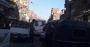 تلال القمامة تسبب شللا مروريا بشارع القومية العربية فى محافظة الجيزة