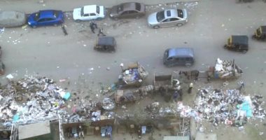 بالصور.. شلل مرورى بشارع القومية العربية فى الجيزة بسبب القمامة و"الكارو" 