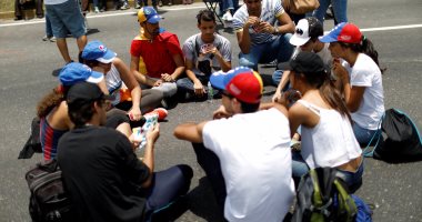 بالصور.. المحتجون فى فنزويلا يواصلون الاعتصام للمطالبة بانتخابات مبكرة