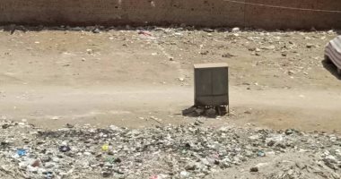 مواطنو شارع الريان بإمبابة يشكون من تجاهل الحى لمعاناتهم من تراكم القمامة