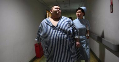 بالصور..أسمن شاب فى الصين يستعد لعملية جراحية لفقد وزنه