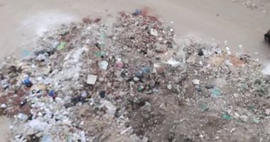 بالصور.. تلال القمامة والمخلفات تغلق شارع يوسف جمال بـ"كعابيش" فى الجيزة