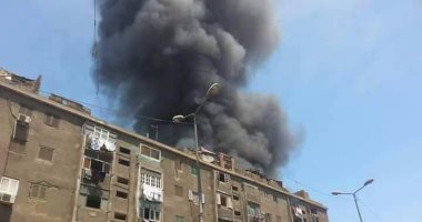 بالفيديو.. الدفع بـ8 سيارات إطفاء لإخماد حريق سوق ملابس فى إمبابة 