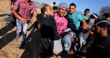 بالصور.. إصابة فلسطينيين فى اشتباكات مع قوات الاحتلال بقطاع غزة