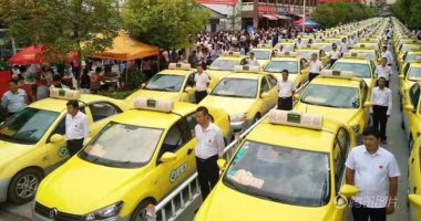 بالصور.. الحكومة الصينية تخصص 700 سيارة لضمان وصول الطلاب لقاعات الامتحان