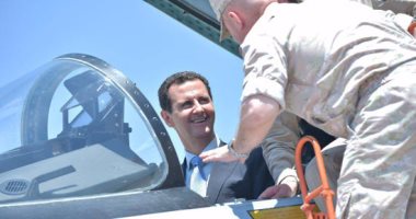 بالصور.. بشار الأسد يزور القاعدة الجوية الروسية فى حميميم