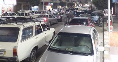 توقف حركة السيارات بكافة محاور القاهرة والمرور ينصح بالتوجه للمسطحات الأرضية 