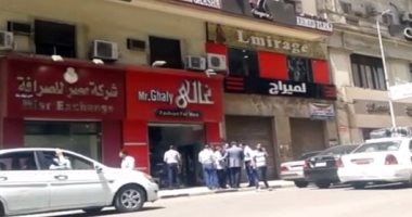شهود عيان: مسلحون احتجزوا موظفى شركة صرافة قصر النيل وخرجوا بحقيبتى أموال