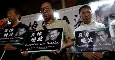 بالصور.. نشطاء يحملون حكومة الصين مسئولية وفاة المعارض "ليو شياوباو"