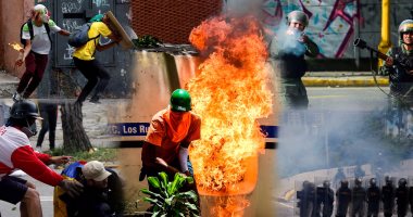قوات الشرطة فى فنزويلا تطلق الغاز المسيل للدموع لتفريق المتظاهرين