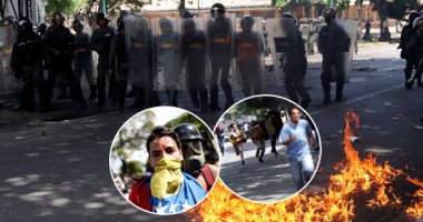 اشتباكات عنيفة بين محتجين والشرطة الفنزويلية فى شوارع العاصمة