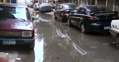 بالصور.. غرق شارع عمارات الشروق بالجيزة فى مياه الصرف الصحى