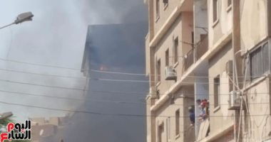 السيطرة على حريق شب داخل شقة سكنية فى العمرانية دون إصابات