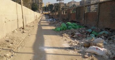 بالصور.. تراكم القمامة يزعج أهالى شارع طارق يحيى عبد الغنى بالهرم