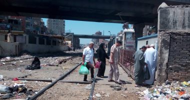 شكاوى من انتشار القمامة فى شارع القومية بإمبابة