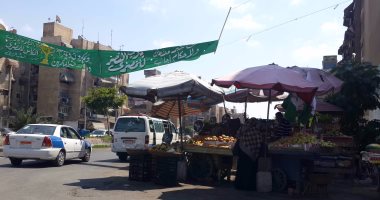 بالصور.. البورسعيدية يرفعون أعلام المصرى بالشوارع: نتمنى التصالح بشكل نهائى