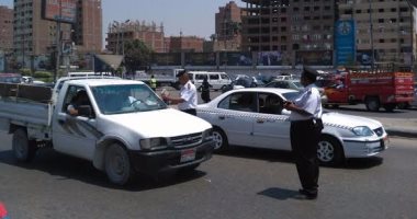حملات مرورية بمحاور القاهرة والجيزة لرصد مخالفى قواعد المرور