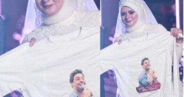عروس تحمل صورة أحمد جمال يوم زفافها.. والفنان يهنئها عبر الهاتف