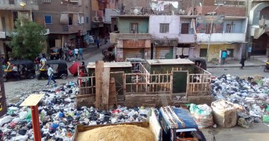 بالصور.. شكوى من انتشار القمامة بشارع الأقصر فى إمبابة
