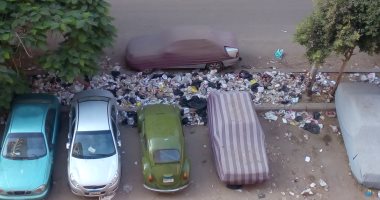 شكوى من تراكم القمامة فى تقاطع شارعى "المساكن- كفر طهرمس" بالهرم
