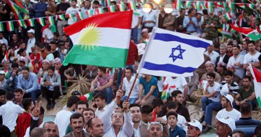 بالصور..أكراد العراق يستفزون العرب برفع علم إسرائيل فى مسيرة داعمة للانفصال