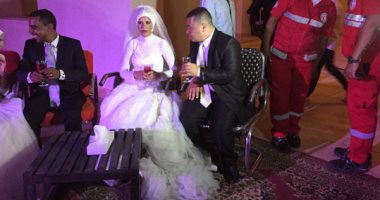 بالفيديو والصور.. البحر الأحمر تقيم حفل زفاف جماعى لـ 25 عروسة 