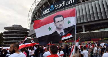  جماهير سوريا ترفع صور بشار الأسد فى مباراة أستراليا