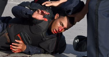 بالصور..اشتباكات عنيفة بين شرطة هندوراس ومحتجين على إعادة انتخاب "أورلاندو"