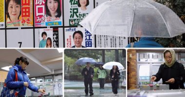 بالصور..إعصار "لان" يهدد بخفض نسبة إقبال المصوتين فى الانتخابات اليابانية