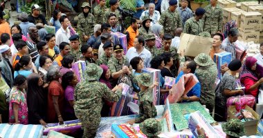 بالصور.. الجيش الماليزى يساعد آلاف المشردين بسبب الفيضانات
